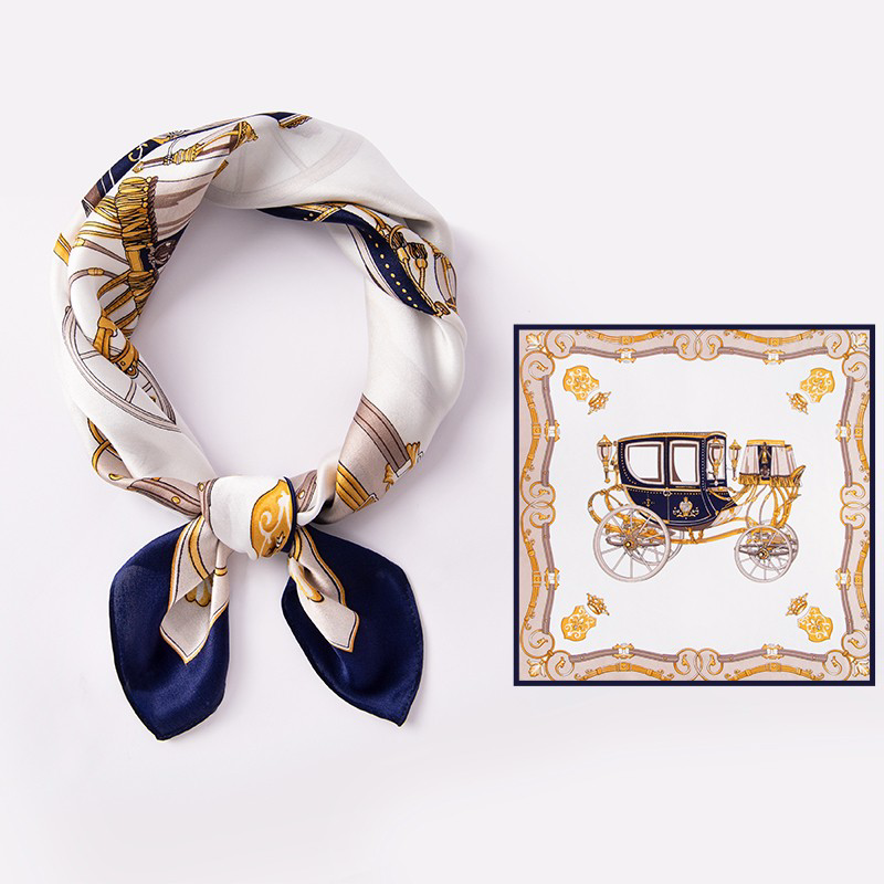 AuraOrient 100% Mulberry silk square scarf shown tied and laid flat, featuring an ornate golden pumpkin carriage motif and a sophisticated navy blue border.