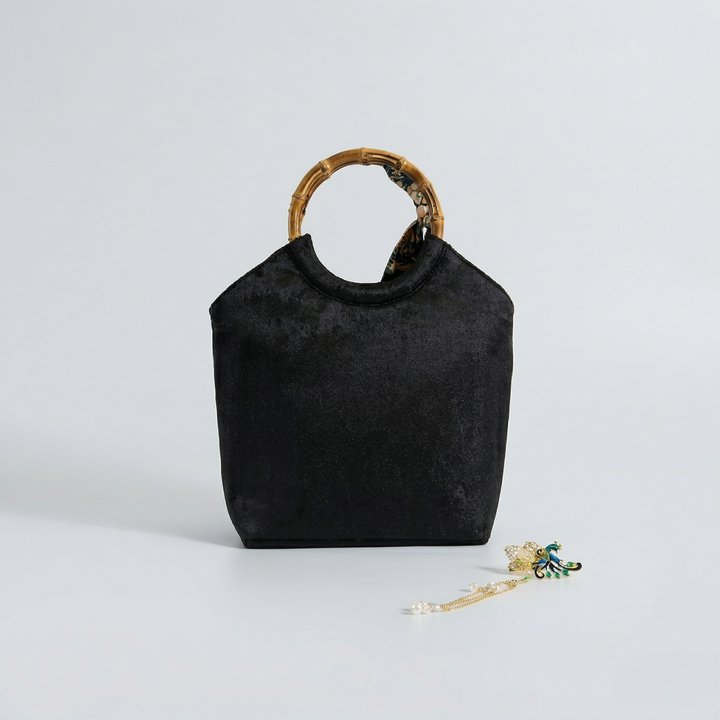 The back view of the black embroidered bamboo tote bag, showing its high-quality fabric and sleek finish.