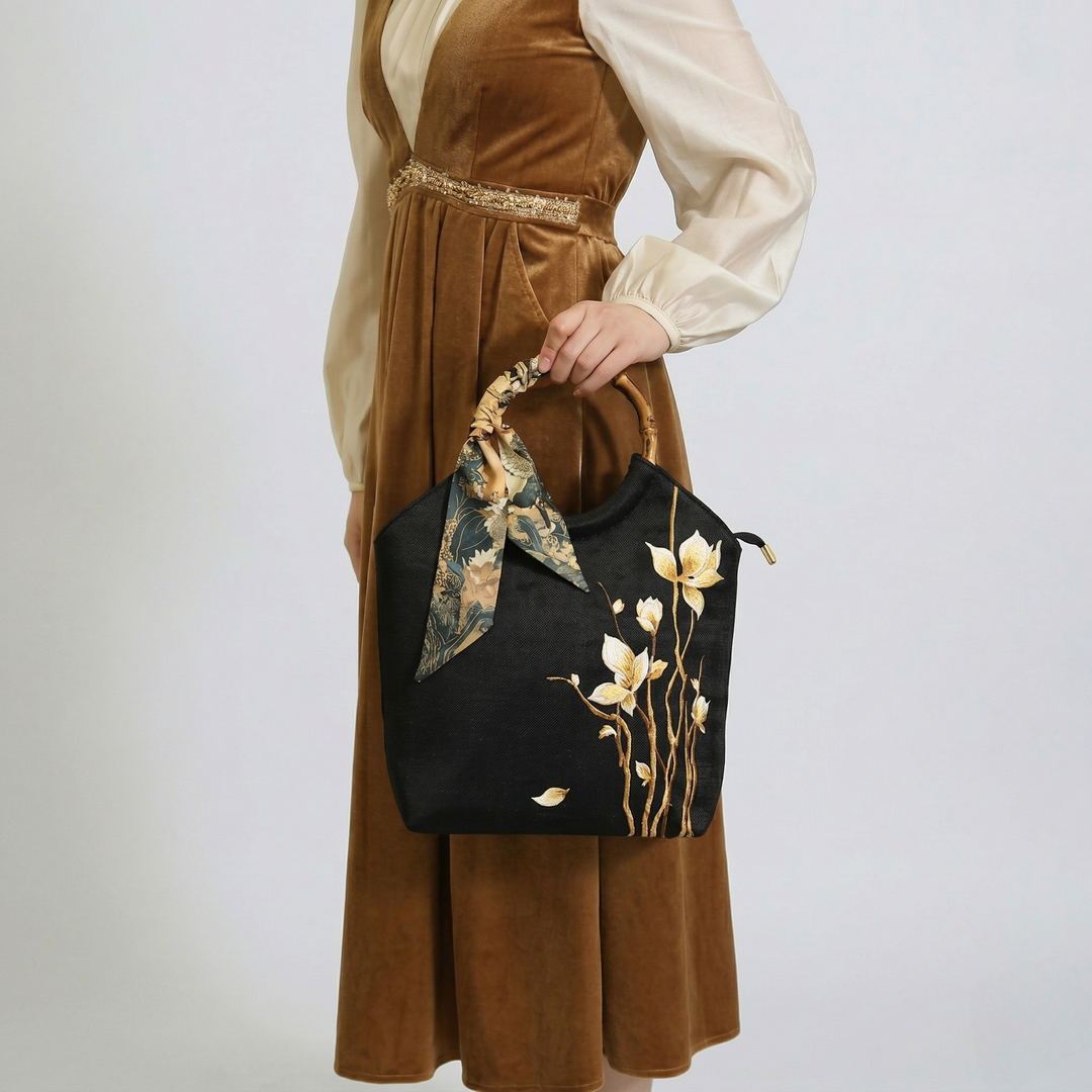 Versatile styling of the black embroidered tote bag, showcasing its large capacity and Oriental charm.
