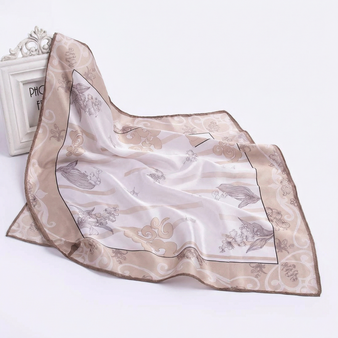 Draped view of a pure silk khaki neckerchief featuring understated minimalist luxury with delicate botanical line art and soft, breathable texture.
