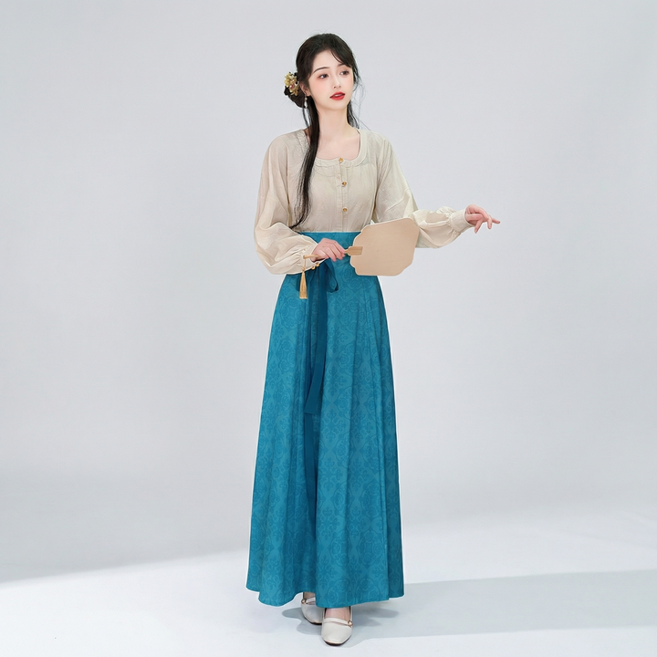 AuraOrient elegant teal blue floral paneled maxi skirt with a high-waisted A-line silhouette, paired with a beige vintage blouse.