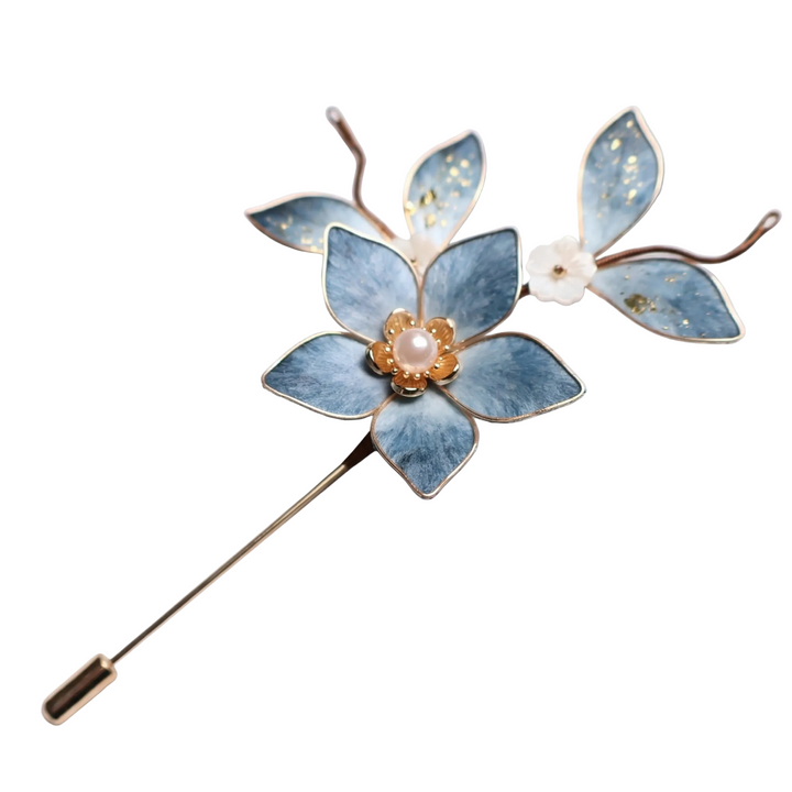 AuraOrient handcrafted blue silk velvet lily brooch with a pearl center, created using traditional Ronghua heritage techniques.