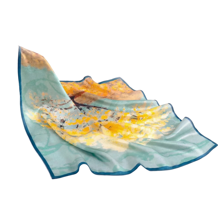 Detailed view of the Oil Painting Tree silk scarf showing the rich, warm hues of an impressionist landscape and the premium silk texture.