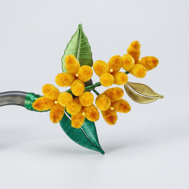 Close-up of the delicate silk velvet Osmanthus flower cluster, highlighting the traditional heritage Ronghua craftsmanship and lifelike texture.