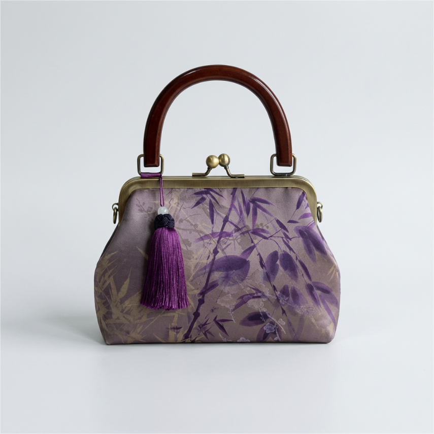 Purple premium artisan silk handbag featuring traditional Oriental floral and bird prints with a matching purple tassel.