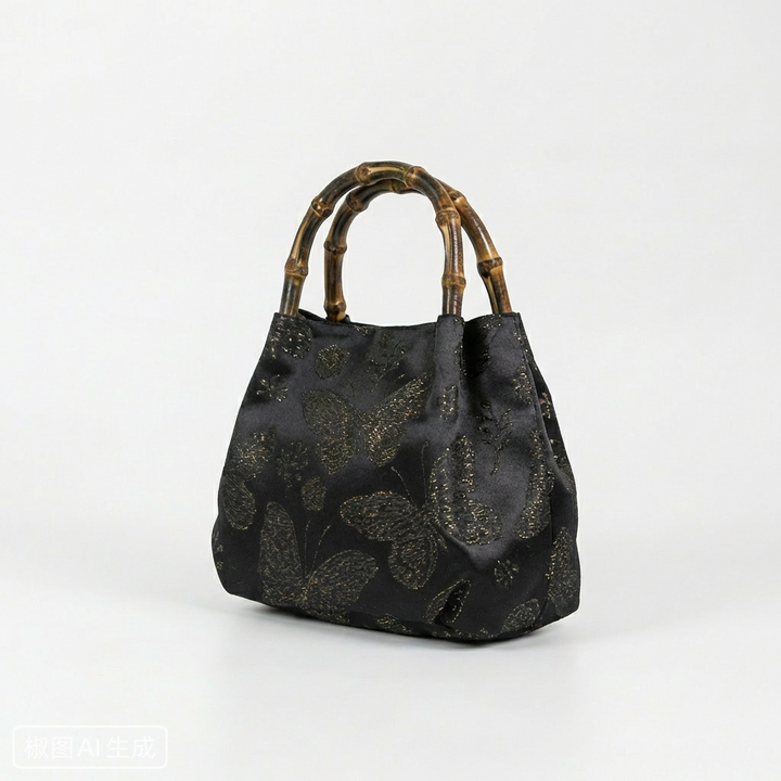 Side profile of the black Zen Garden bamboo satchel highlighting its elegant and structured silhouette.