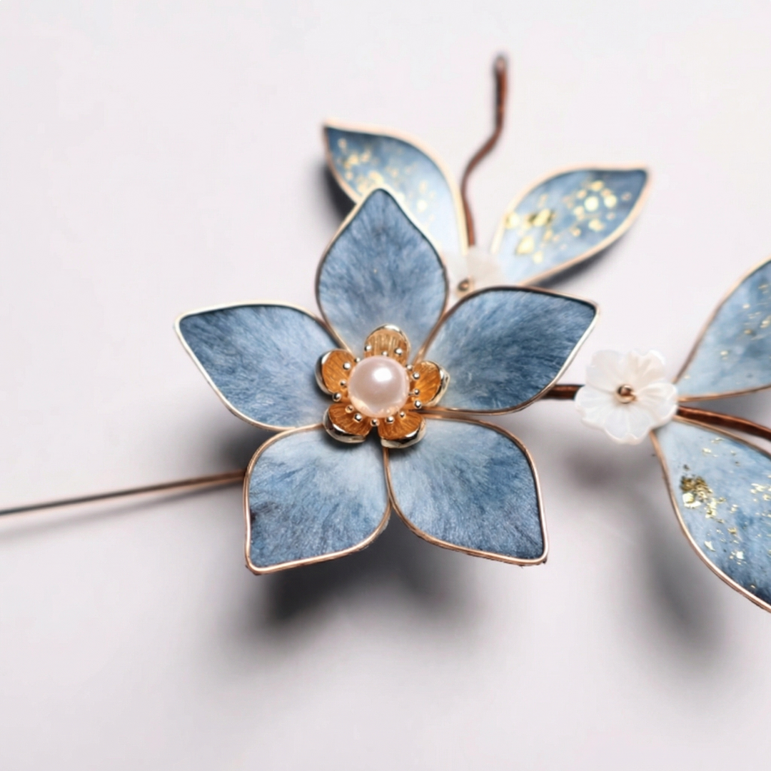 Close-up detail of the hand-sculpted silk velvet petals and intricate pearl craftsmanship of the blue lily floral brooch.