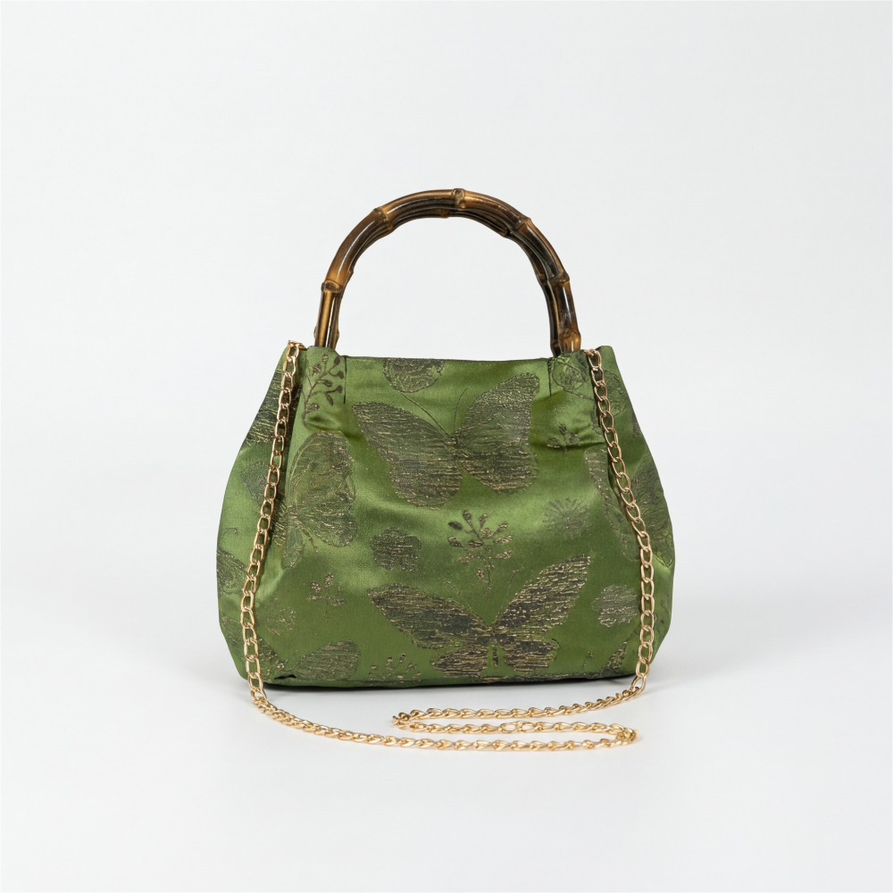 Zen-style green brocade bag with bamboo handles, perfect for cultural events or everyday elegance.