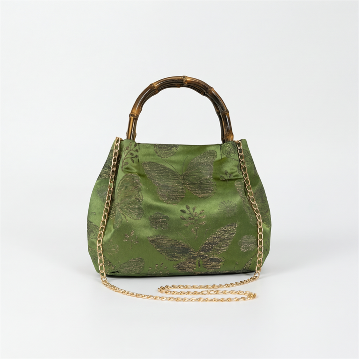 Zen-style green brocade bag with bamboo handles, perfect for cultural events or everyday elegance.